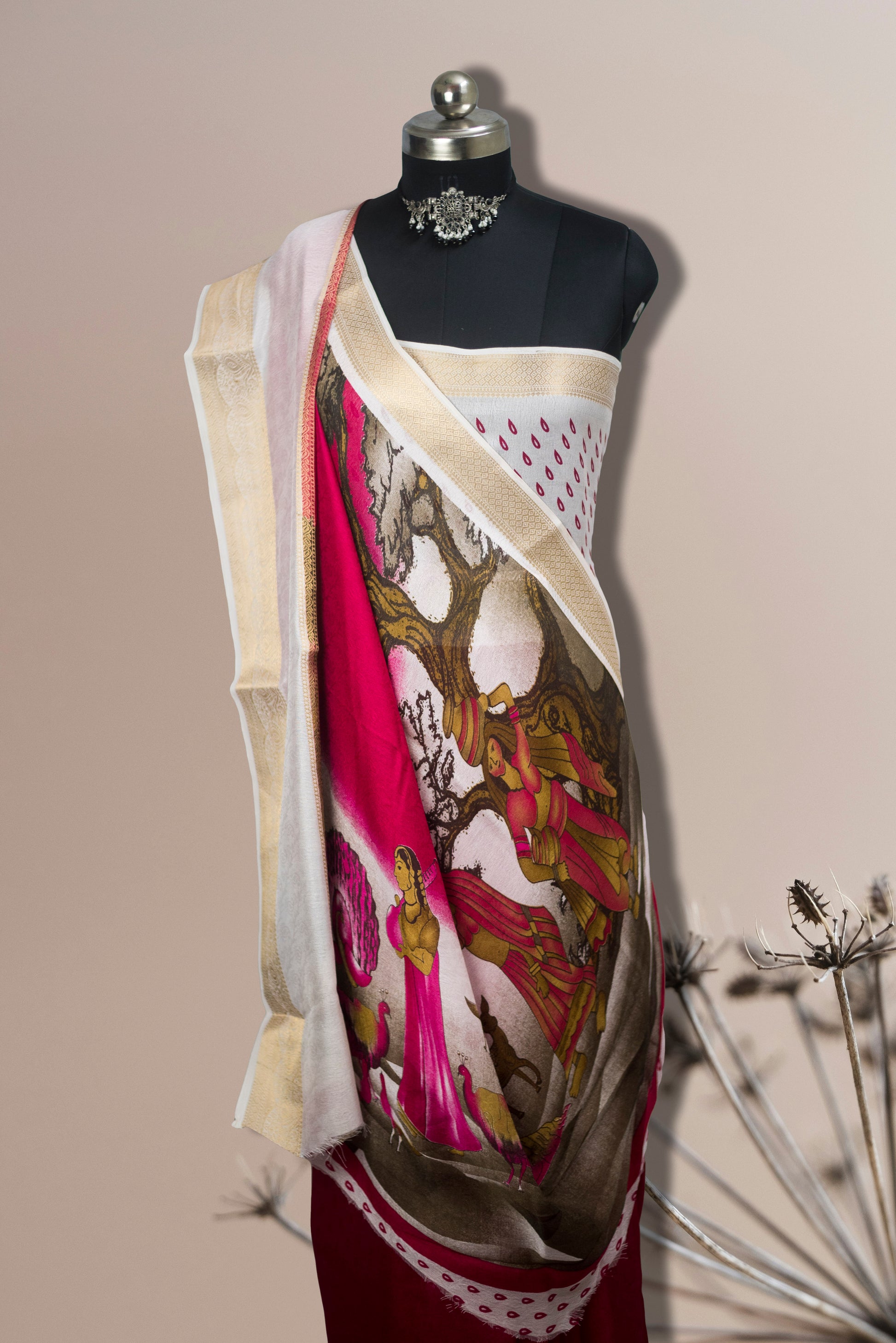 premium-mysore-silk-crepe-saree  a colorful scarf with a tree design on a plain background