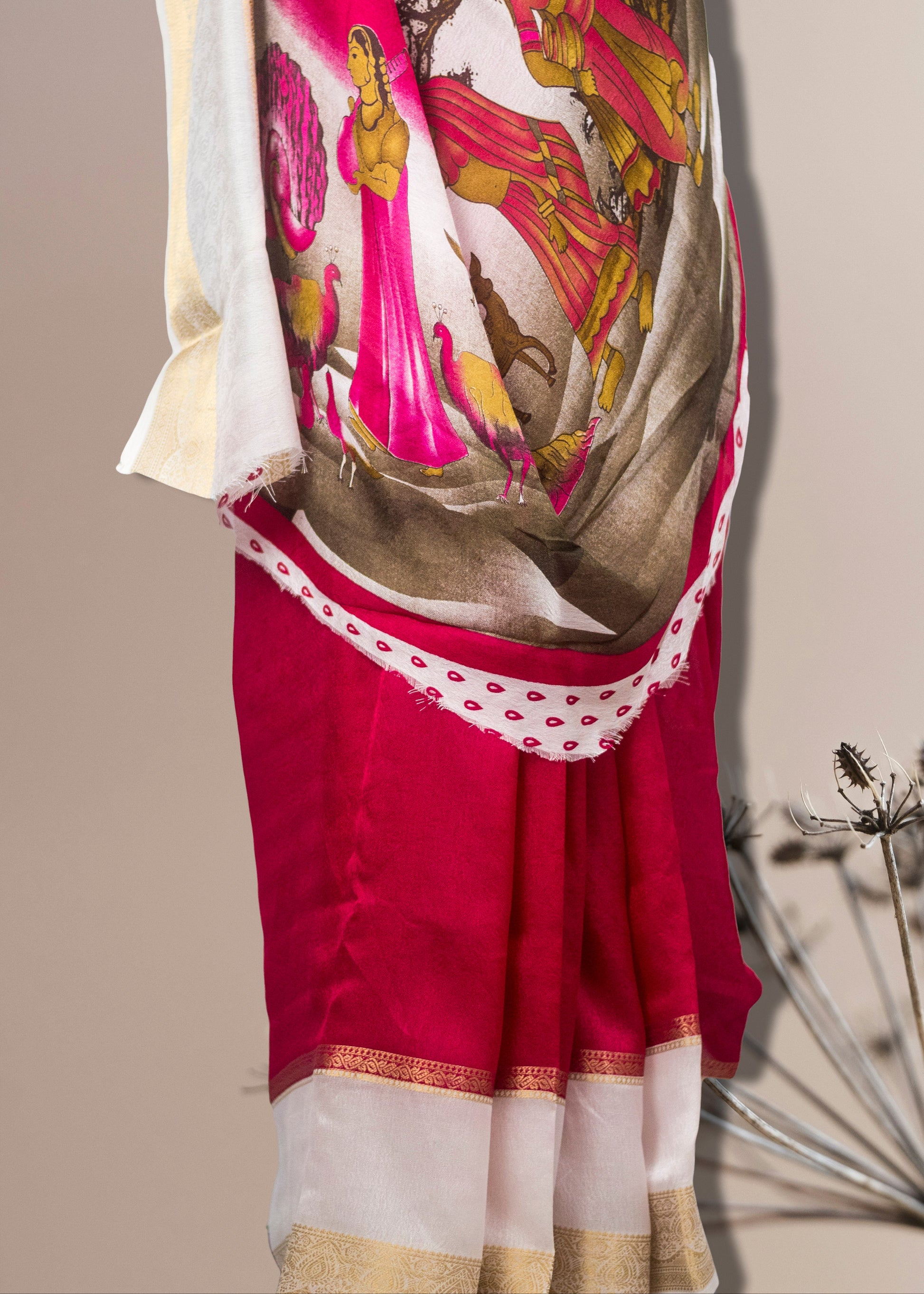 Mysore silk crepe saree front drape look in elegant finish Traditional outfit with a colorful scarf and red skirt on a beige background